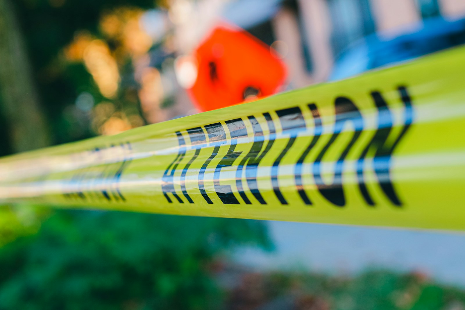 A close up of a yellow caution tape